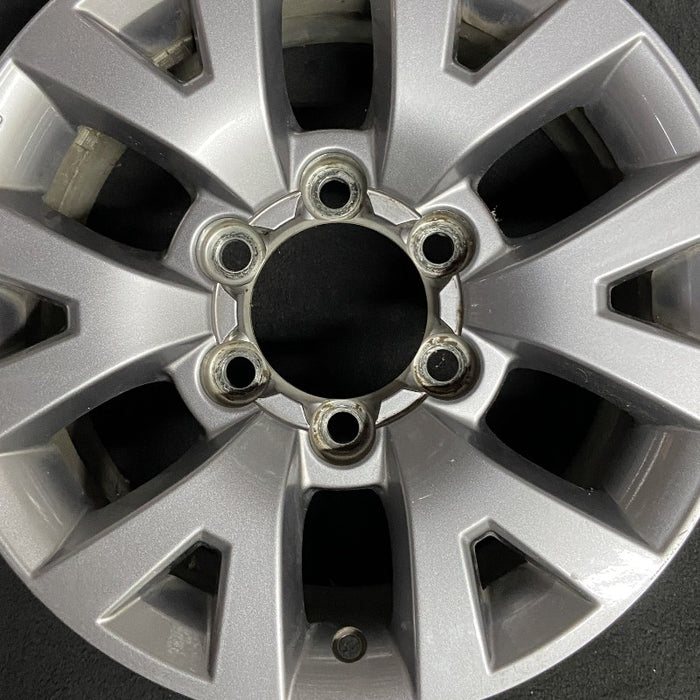 16" TACOMA 20-23 16x7 alloy 6 spoke V spoke dark gray Original OEM Wheel Rim - Angle View