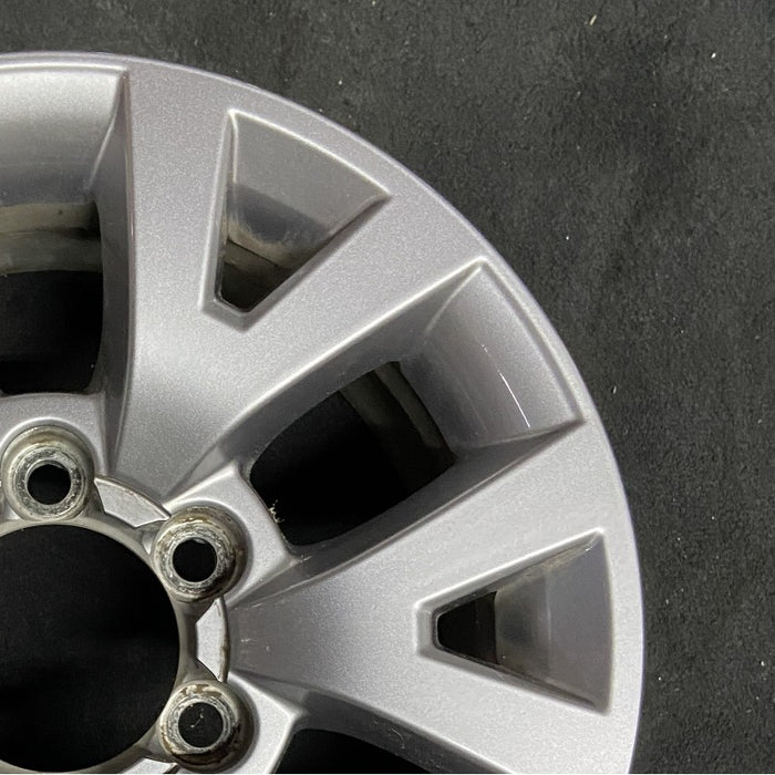 16" TACOMA 20-23 16x7 alloy 6 spoke V spoke dark gray Original OEM Wheel Rim - Close-Up Detail