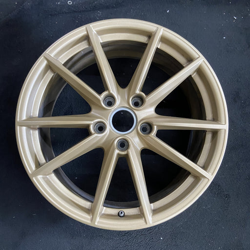 20" PORSCHE 911 20-23 20x8.5, 10 spoke, straight spoke, w/o machined face; gold - Angle View