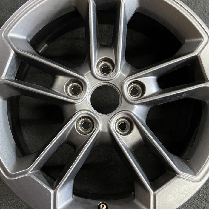 17" WRANGLER 16-17 17x7.5 10 slot w/75th Anniversary package finish brze - Angle View