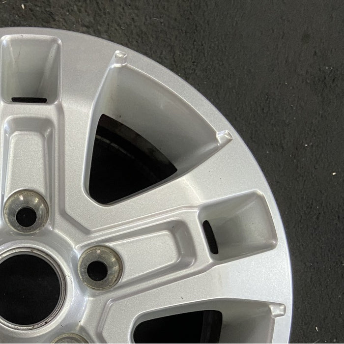 16" PROMASTER 1500 VAN 23 16x6 aluminum silver Original OEM Wheel Rim - Close-Up Detail