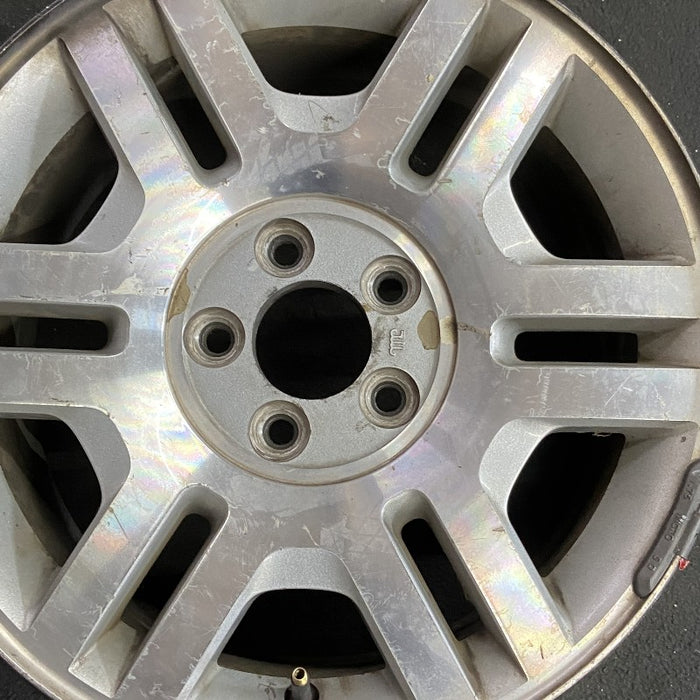 17" MOUNTAINEER 02-03 17x7.5 aluminum 6 double spokes Original OEM Wheel Rim - Angle View