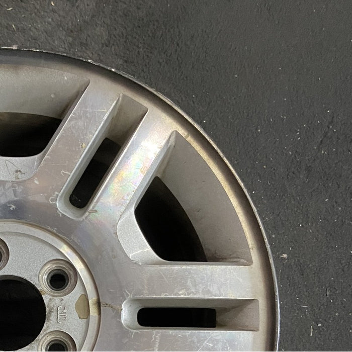 17" MOUNTAINEER 02-03 17x7.5 aluminum 6 double spokes Original OEM Wheel Rim - Close-Up Detail