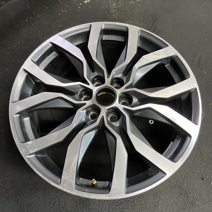 20" XT5 21-25 20x8, 12 spoke, machined face with black pockets Original OEM - Side Profile