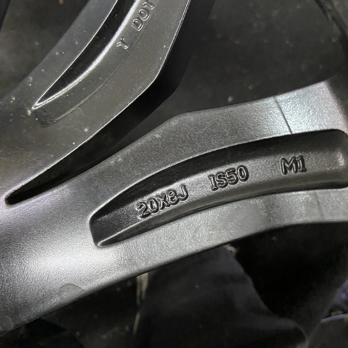 20" XT5 21-25 20x8, 12 spoke, machined face with black pockets Original OEM - Back View