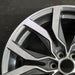 20" XT5 21-24 20x8 12 spoke machined face with black pockets opt Q6N Original - Side Profile