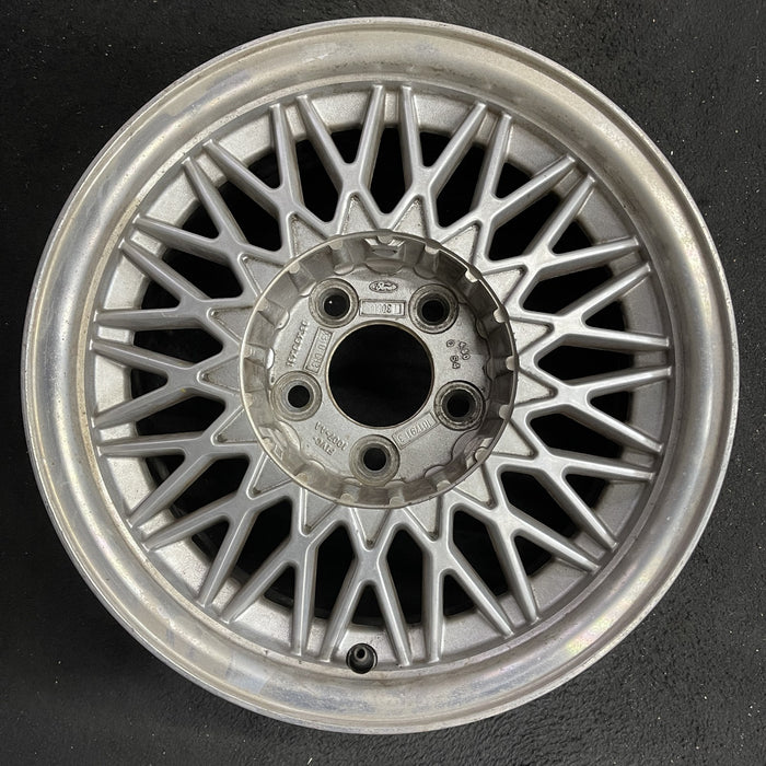 15" COUGAR 92 15x6.5 , w/Anniversary package Original OEM Wheel Rim - Angle View