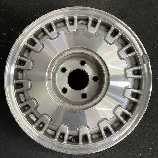 16" DEVILLE 97 16x7 , 32 rib, brushed finish Original OEM Wheel Rim - Angle View