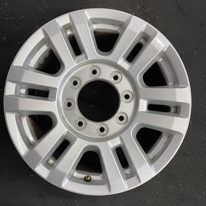 18" FORD F250SD PICKUP 17 18x8 , aluminum, 12 spoke , silver Original OEM Wheel - Angle View
