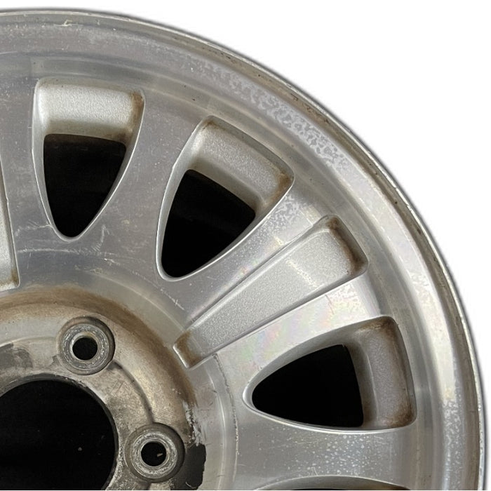 17" EXPEDITION 01-02 14mm lug 16mm hole 17x7.5 aluminum 10 triangular holes beige in pockets Original OEM Wheel Rim