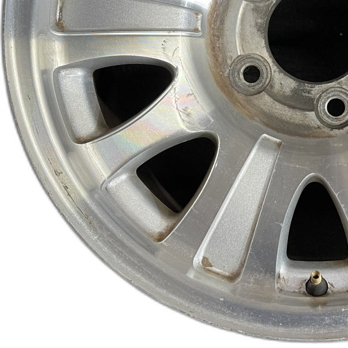 17" EXPEDITION 01-02 14mm lug 16mm hole 17x7.5 aluminum 10 triangular holes beige in pockets Original OEM Wheel Rim