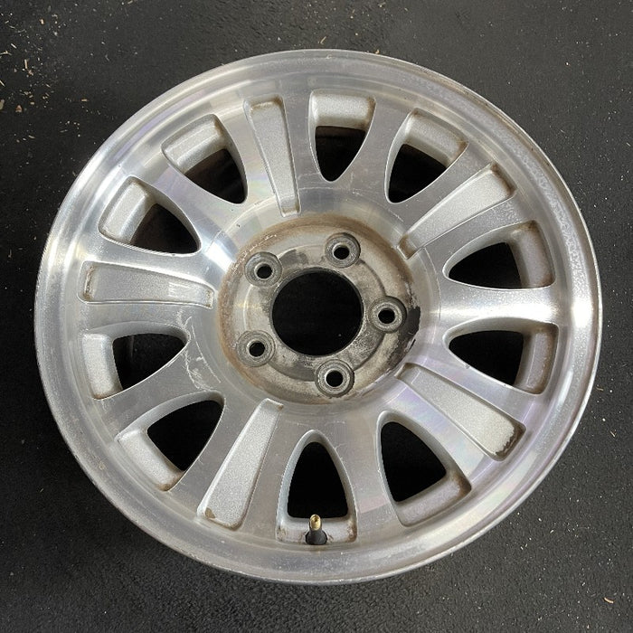 17" EXPEDITION 01-02 14mm lug 16mm hole 17x7.5 aluminum 10 triangular holes beige in pockets Original OEM Wheel Rim