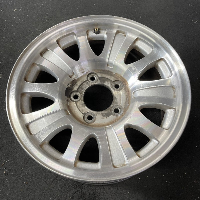 17" EXPEDITION 01-02 14mm lug 16mm hole 17x7.5 aluminum 10 triangular holes beige in pockets Original OEM Wheel Rim