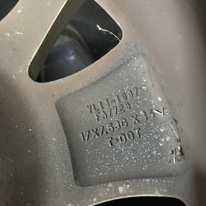 17" EXPEDITION 01-02 14mm lug 16mm hole 17x7.5 aluminum 10 triangular holes beige in pockets Original OEM Wheel Rim