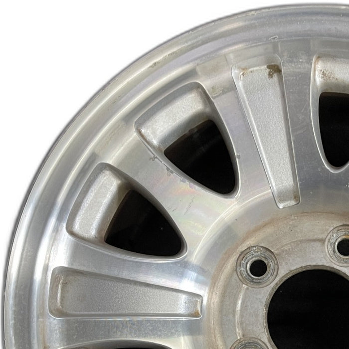 17" EXPEDITION 01-02 14mm lug 16mm hole 17x7.5 aluminum 10 triangular holes beige in pockets Original OEM Wheel Rim