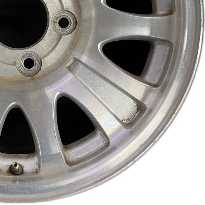 17" EXPEDITION 01-02 14mm lug 16mm hole 17x7.5 aluminum 10 triangular holes beige in pockets Original OEM Wheel Rim