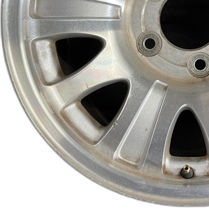 17" EXPEDITION 01-02 14mm lug 16mm hole 17x7.5 aluminum 10 triangular holes beige in pockets Original OEM Wheel Rim