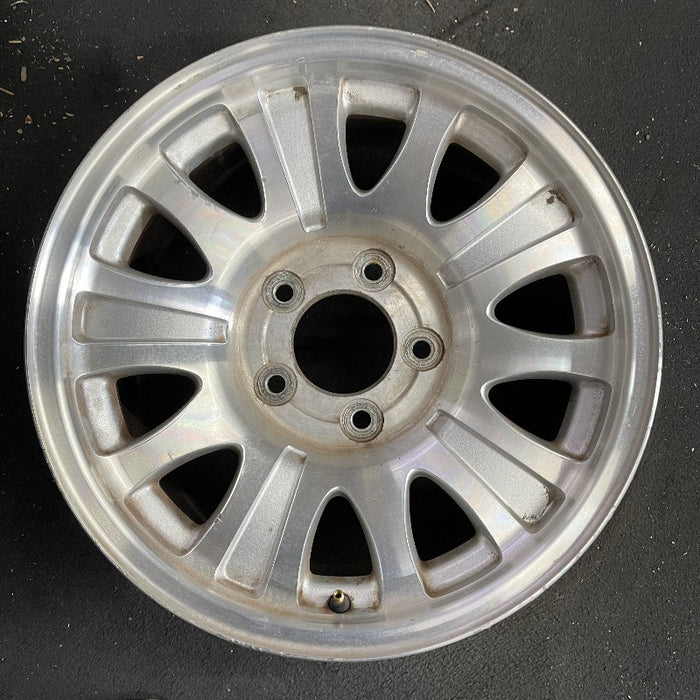 17" EXPEDITION 01-02 14mm lug 16mm hole 17x7.5 aluminum 10 triangular holes beige in pockets Original OEM Wheel Rim