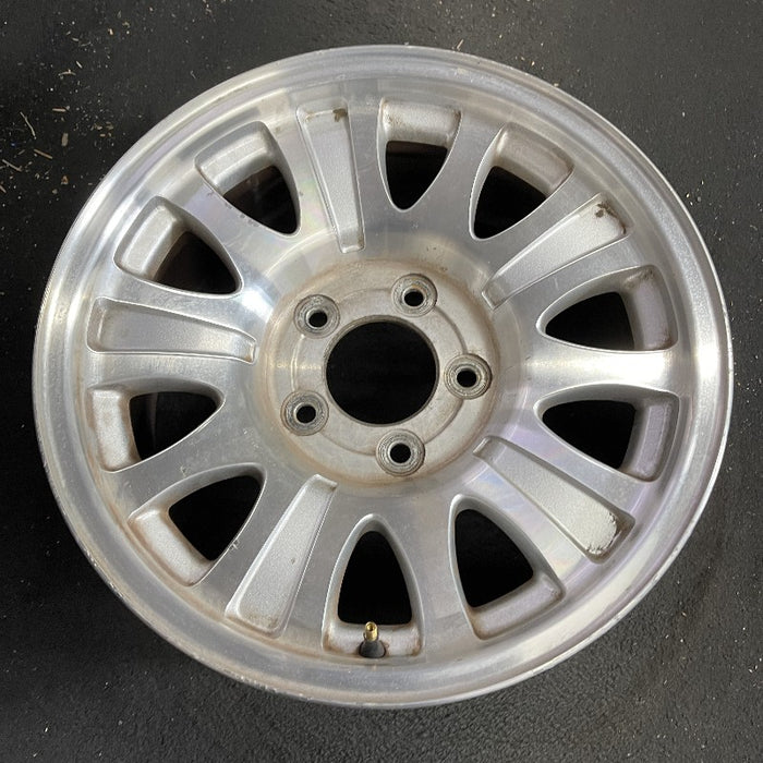 17" EXPEDITION 01-02 14mm lug 16mm hole 17x7.5 aluminum 10 triangular holes beige in pockets Original OEM Wheel Rim