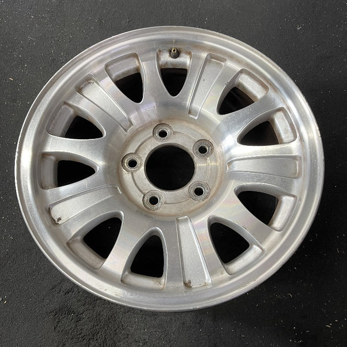 17" EXPEDITION 01-02 14mm lug 16mm hole 17x7.5 aluminum 10 triangular holes beige in pockets Original OEM Wheel Rim