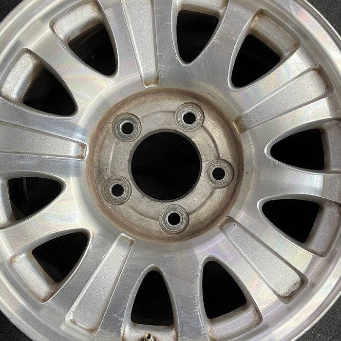 17" EXPEDITION 01-02 14mm lug 16mm hole 17x7.5 aluminum 10 triangular holes beige in pockets Original OEM Wheel Rim