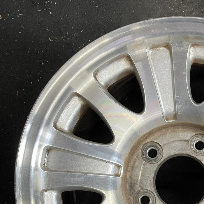 17" EXPEDITION 01-02 14mm lug 16mm hole 17x7.5 aluminum 10 triangular holes beige in pockets Original OEM Wheel Rim