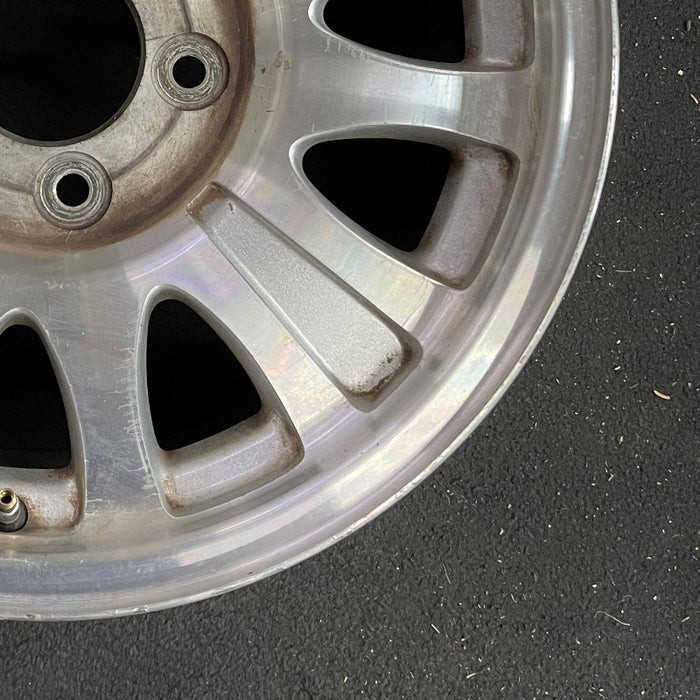 17" EXPEDITION 01-02 14mm lug 16mm hole 17x7.5 aluminum 10 triangular holes beige in pockets Original OEM Wheel Rim