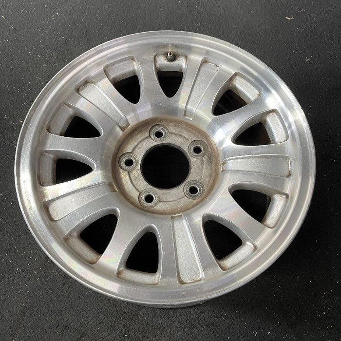 17" EXPEDITION 01-02 14mm lug 16mm hole 17x7.5 aluminum 10 triangular holes beige in pockets Original OEM Wheel Rim