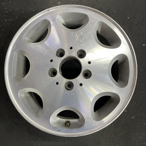 15" MERCEDES E-CLASS 95 124 Type; E300D, 15x6.5, 8 hole Original OEM Wheel Rim - Angle View