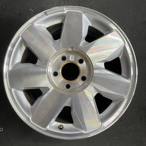 17" DEVILLE 03 5 lug, DTS, 17x7.5, 7 spoke, silver finish Original OEM Wheel Rim - Angle View