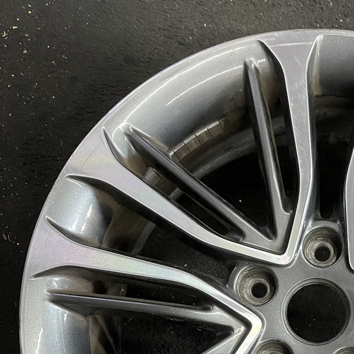 18" VELOSTER 16 18x7.5 w/o body color accents; 20 spoke two te Original OEM - Side Profile