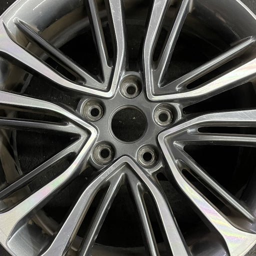 18" VELOSTER 16 18x7.5 w/o body color accents; 20 spoke two te Original OEM - Angle View