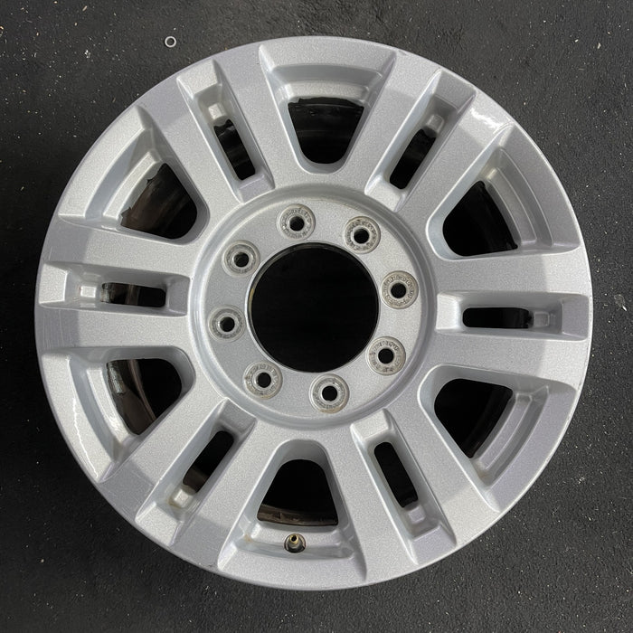 18" FORD F250SD PICKUP 17 18x8 , aluminum, 12 spoke , silver Original OEM Wheel - Angle View