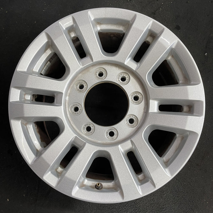 18" FORD F250SD PICKUP 17 18x8 , aluminum, 12 spoke , silver Original OEM Wheel - Angle View