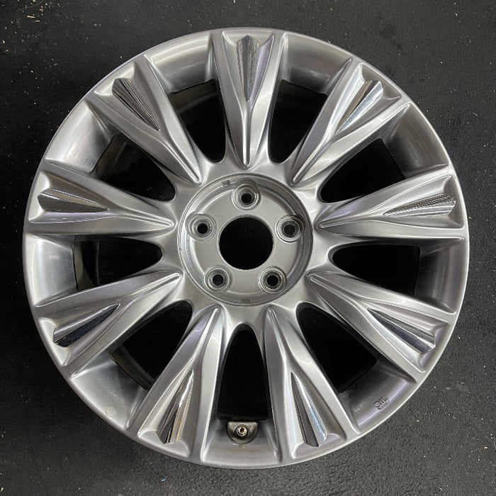 18" GENESIS 09-12 Sdn 18x7.5 9 spoke covered lugs Original OEM Wheel Rim - Front View