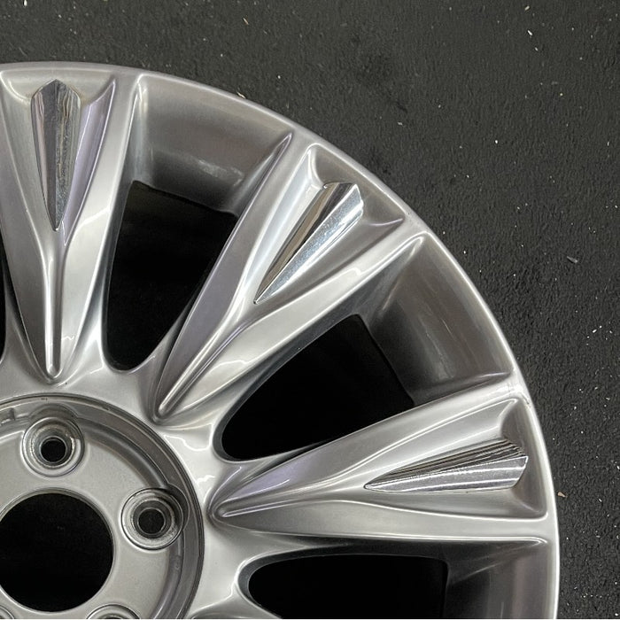 18" GENESIS 09-12 Sdn 18x7.5 9 spoke covered lugs Original OEM Wheel Rim - Close-Up Detail