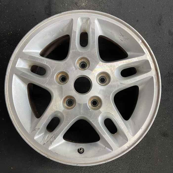 16" GRAND CHEROKEE 99-00 16x7, aluminum, 5 large triangular holes Original OEM Wheel Rim
