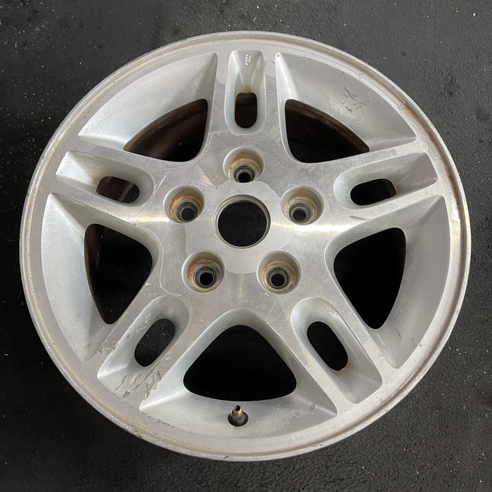 16" GRAND CHEROKEE 99-00 16x7, aluminum, 5 large triangular holes Original OEM Wheel Rim