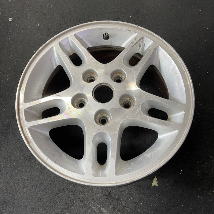 16" GRAND CHEROKEE 99-00 16x7, aluminum, 5 large triangular holes Original OEM Wheel Rim