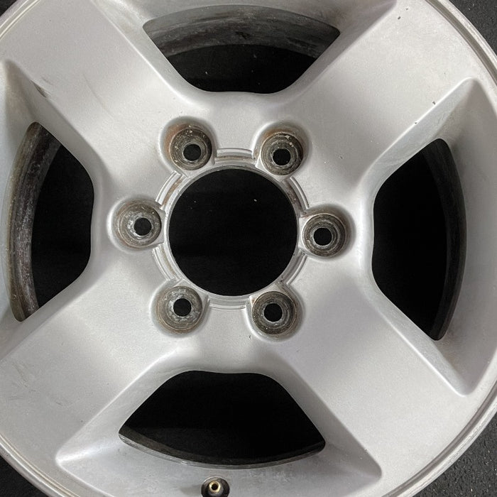 16" XTERRA 04 16x7 alloy 4 spoke flat spoke silver XE Original OEM Wheel Rim