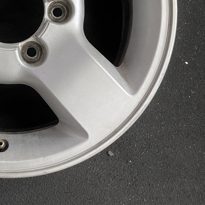 16" XTERRA 04 16x7 alloy 4 spoke flat spoke silver XE Original OEM Wheel Rim