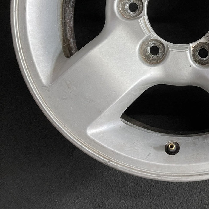 16" XTERRA 04 16x7 alloy 4 spoke flat spoke silver XE Original OEM Wheel Rim