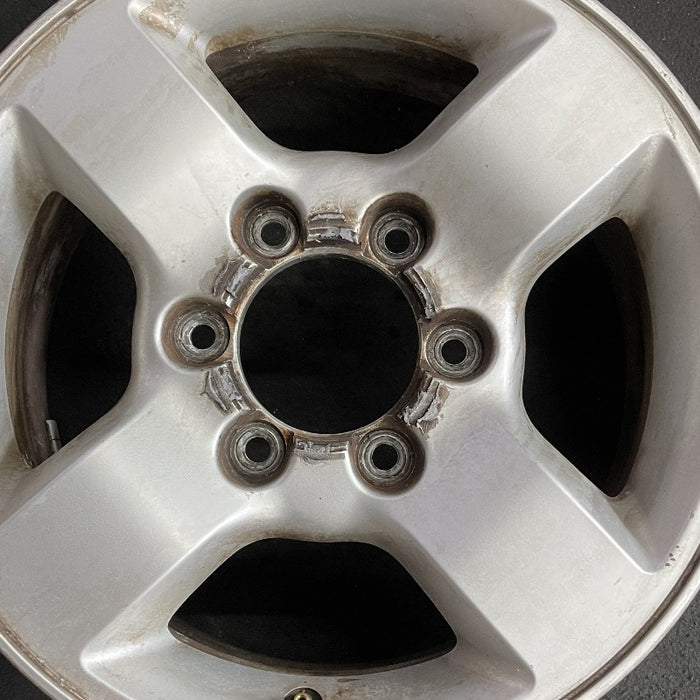 16" XTERRA 04 16x7 alloy 4 spoke flat spoke silver XE Original OEM Wheel Rim