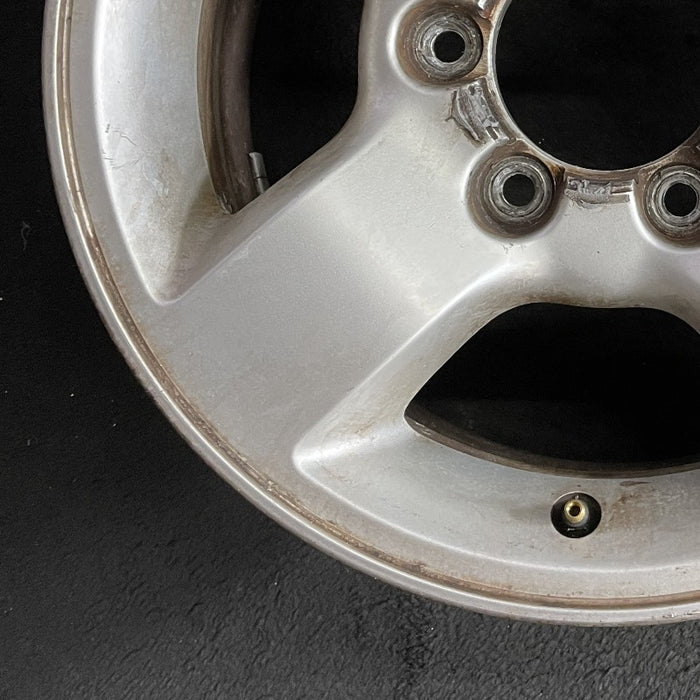 16" XTERRA 04 16x7 alloy 4 spoke flat spoke silver XE Original OEM Wheel Rim