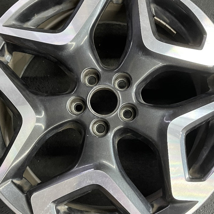 18" XV CROSSTREK 18 18x7 alloy w/machined face Limited dark gray Original OEM - Angle View