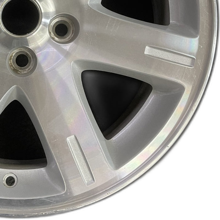 17" 300 05-06 17x7 aluminum 7 spoke exposed lugs machine Original OEM Wheel Rim - Close-Up Detail
