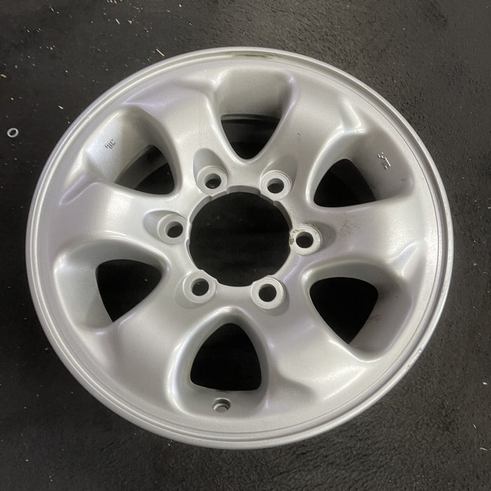 15" MONTERO 94-02 15x6, alloy Original OEM Wheel Rim - Side Profile
