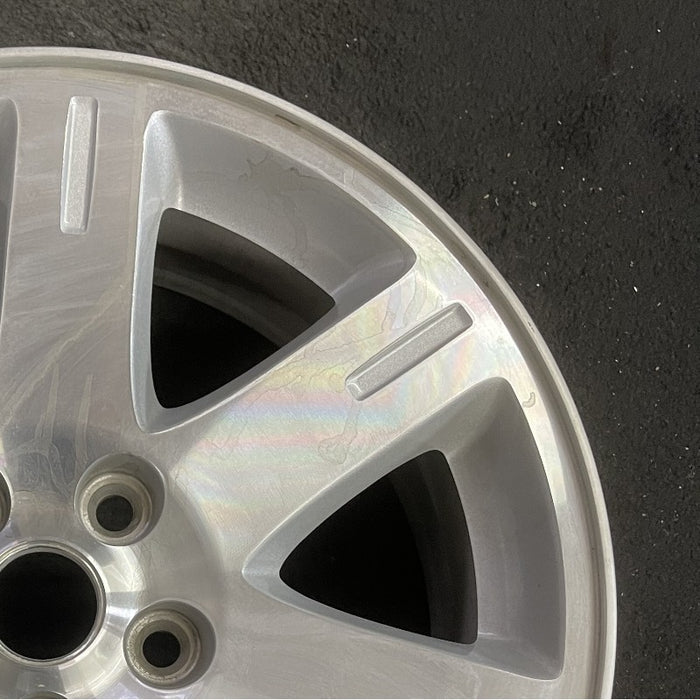 17" 300 05-06 17x7 aluminum 7 spoke exposed lugs machine Original OEM Wheel Rim - Close-Up Detail