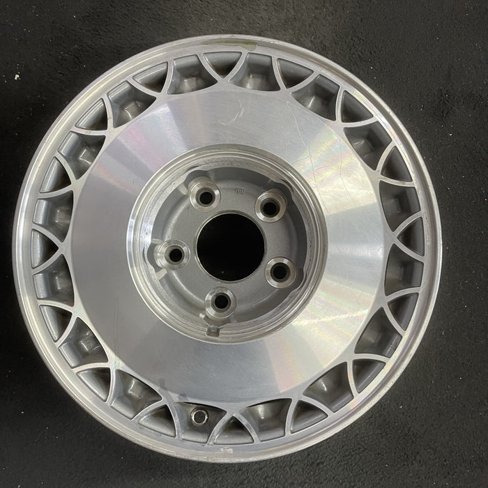 15" FLEETWOOD 93 RWD, 15x7 , web design Original OEM Wheel Rim - Angle View