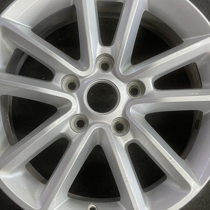 17" CARAVAN 13 17x6.5 aluminum V spoke fully opt WGH Original OEM Wheel Rim - Angle View